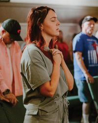 Praying lady at Trinity Church Palestine, Texas